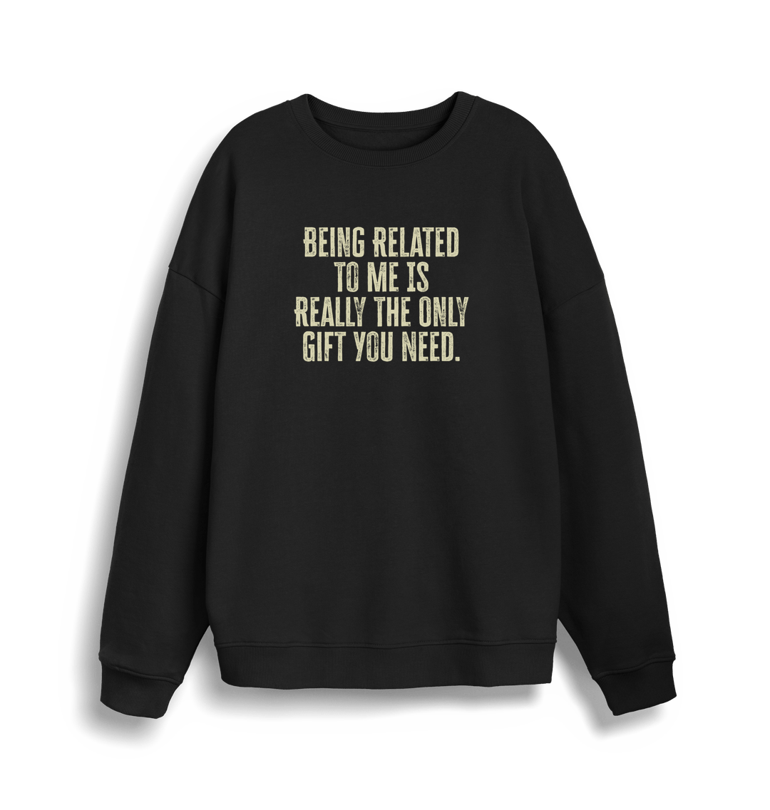 back christmas jumper with the slogan 'being related to me is really the only gift you need'