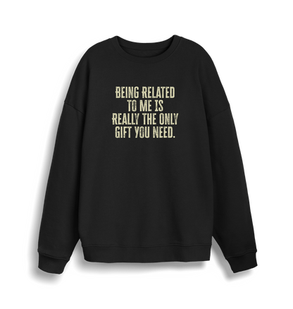 back christmas jumper with the slogan 'being related to me is really the only gift you need'