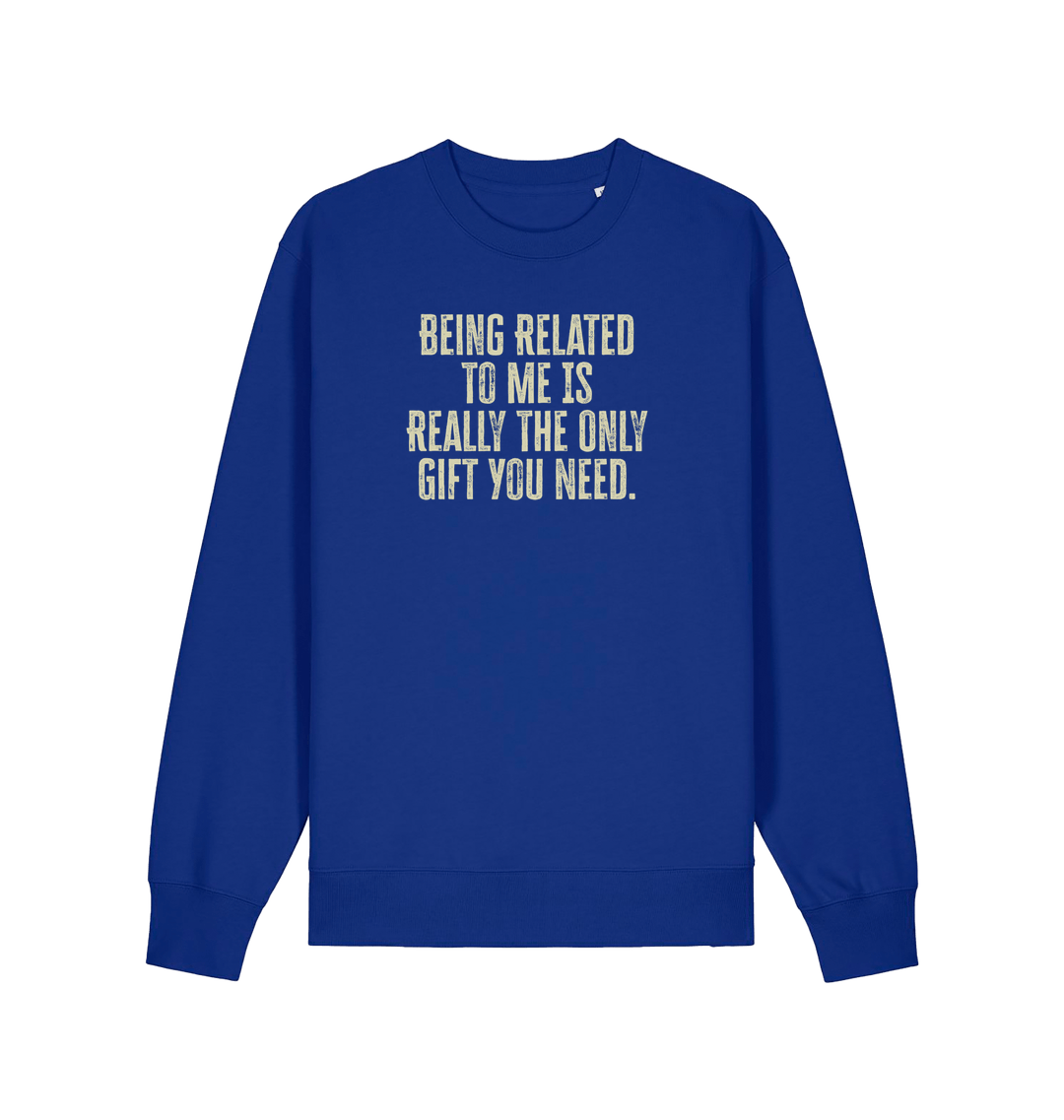 blue christmas jumper with the slogan 'being related to me is really the only gift you need'