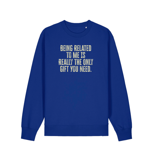 blue christmas jumper with the slogan 'being related to me is really the only gift you need'