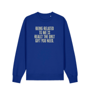 blue christmas jumper with the slogan 'being related to me is really the only gift you need'