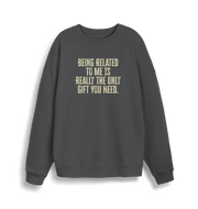 grey christmas jumper with the slogan 'being related to me is really the only gift you need'