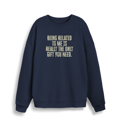 navy christmas jumper with the slogan 'being related to me is really the only gift you need'