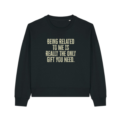 black christmas sweater with the slogan 'being related to me is really the only gift you need'