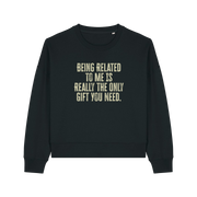 black christmas sweater with the slogan 'being related to me is really the only gift you need'