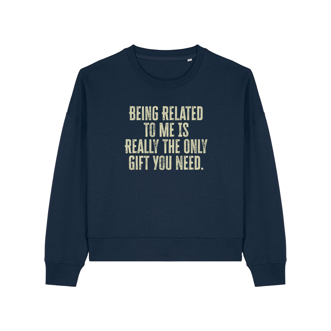 navy christmas sweater with the slogan 'being related to me is really the only gift you need'