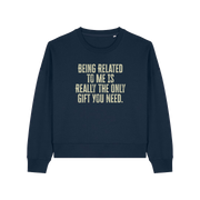 navy christmas sweater with the slogan 'being related to me is really the only gift you need'