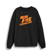 black christmas sweater with the slogan 'the gobbling'