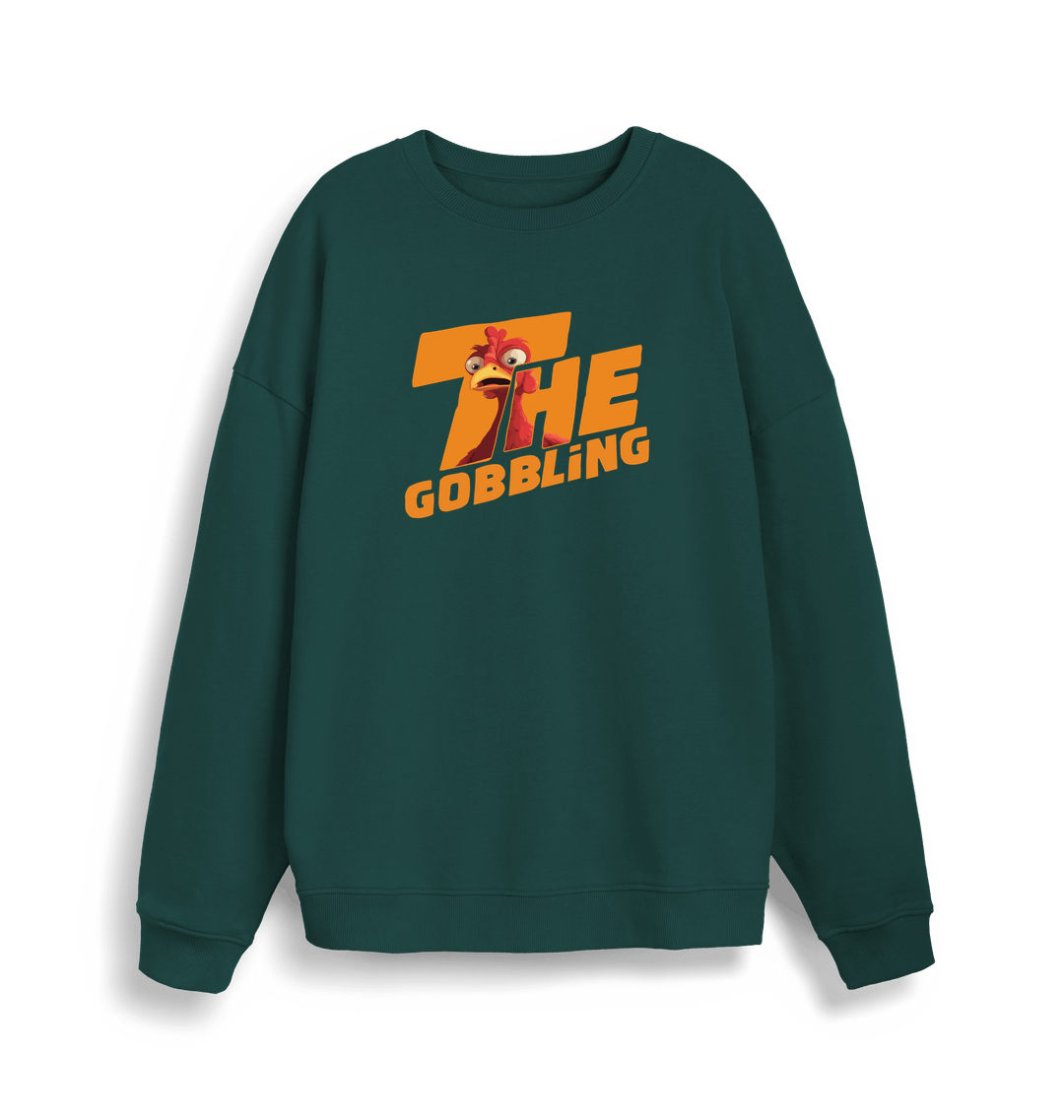 green christmas sweater with the slogan 'the gobbling'