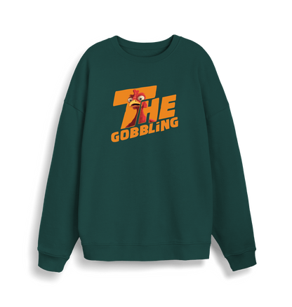 green christmas sweater with the slogan 'the gobbling'