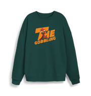green christmas sweater with the slogan 'the gobbling'