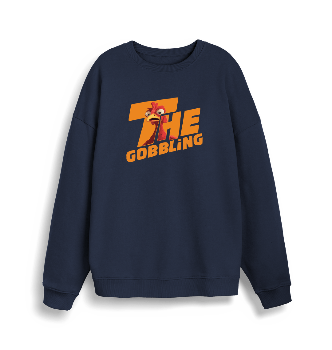 navy christmas sweater with the slogan 'the gobbling'