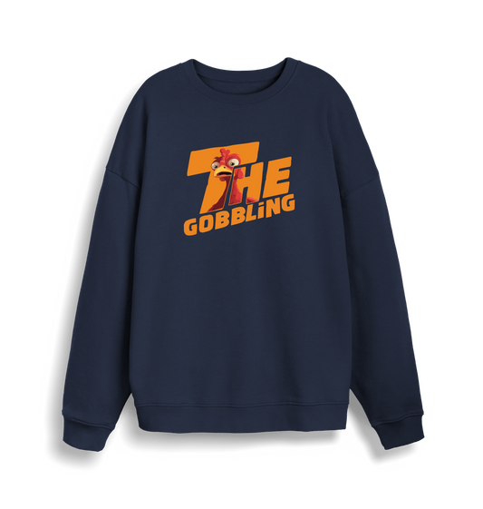 navy christmas sweater with the slogan 'the gobbling'