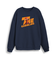 navy christmas sweater with the slogan 'the gobbling'