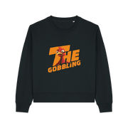 black christmas sweater with the slogan 'the gobbling' and the graphic of a turkey inside the writing