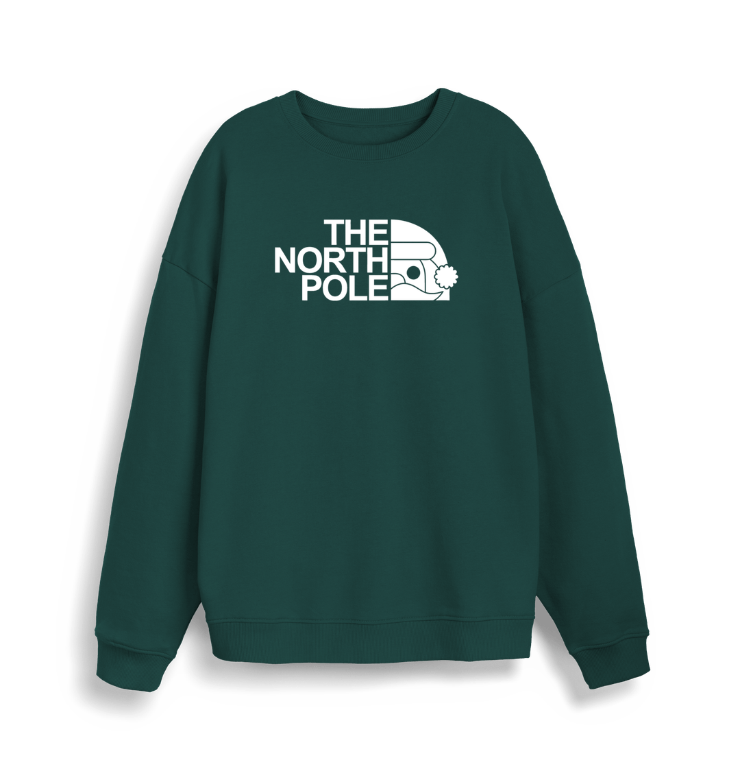 green christmas sweater with the slogan 'the north pole'