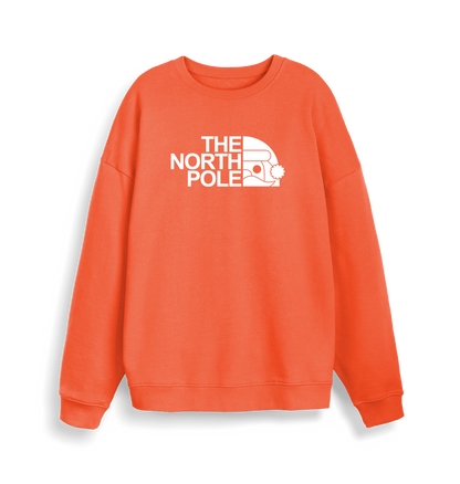 orange christmas sweater with the slogan 'the north pole'