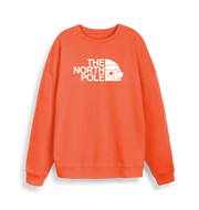 orange christmas sweater with the slogan 'the north pole'