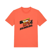orange geek t-shirt with 'the shinning' and a cartoon graphic inside 