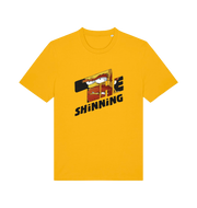yellow geek t-shirt with 'the shinning' and a cartoon graphic inside 