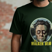 Person wearing a green parody t-shirt with a zombie Christopher Walken 'The Walken Dead' graphic design.