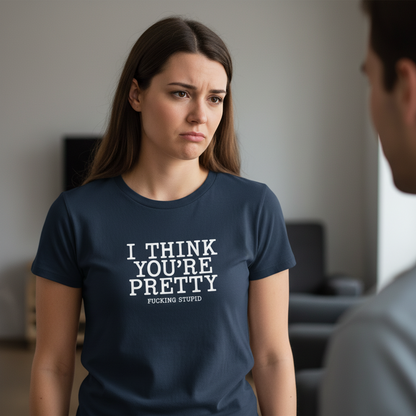 Woman wearing a navy blue t-shirt with text, looking at a man.