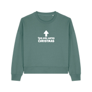green christmas sweater with the slogan 'this girl hates christmas'