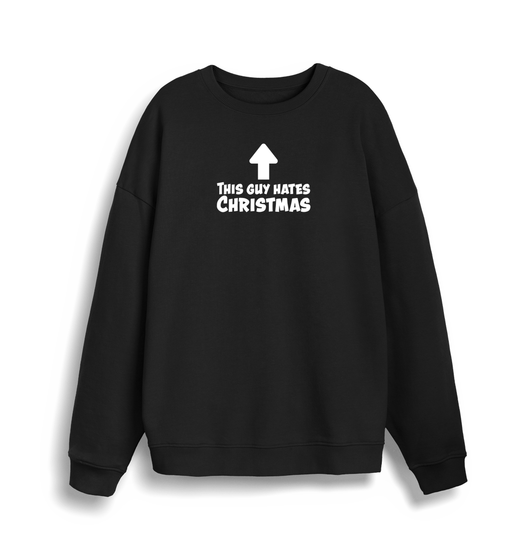 black xmas sweater with the slogan 'this guy hates christmas'