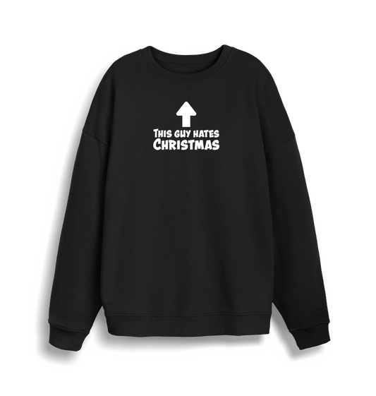black xmas sweater with the slogan 'this guy hates christmas'