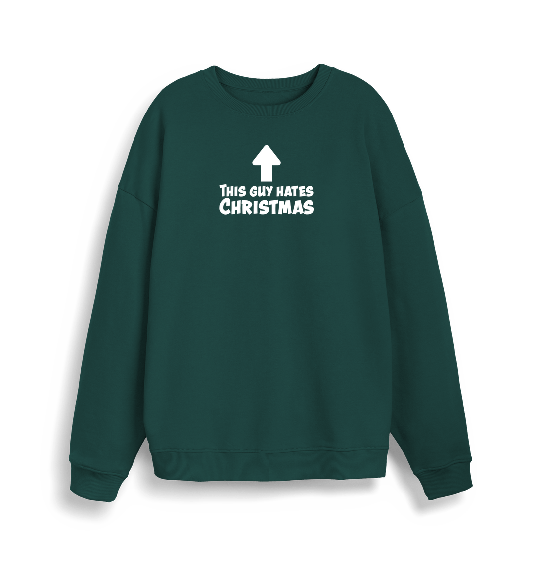 green xmas sweater with the slogan 'this guy hates christmas'