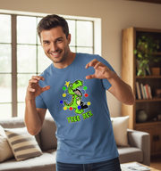 Man wearing a blue t-shirt with a colorful dinosaur graphic and 'TREE REX' text in a living room.