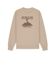 sand christmas sweater with the graphic of rudolph stood on top of a pile of reindeer and the slogan 'they used to laugh and call him names used to... '