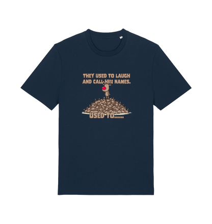 navy christmas t-shirt with the graphic of rudolph stood on tp of a pile of reindeer and the slogan 'they used to call him names used to...'