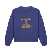 blue christmas sweater with the graphic of rudoph stood ontop of a pile of reindeer and the slogan 'they used to laugh and call him names used to ..'
