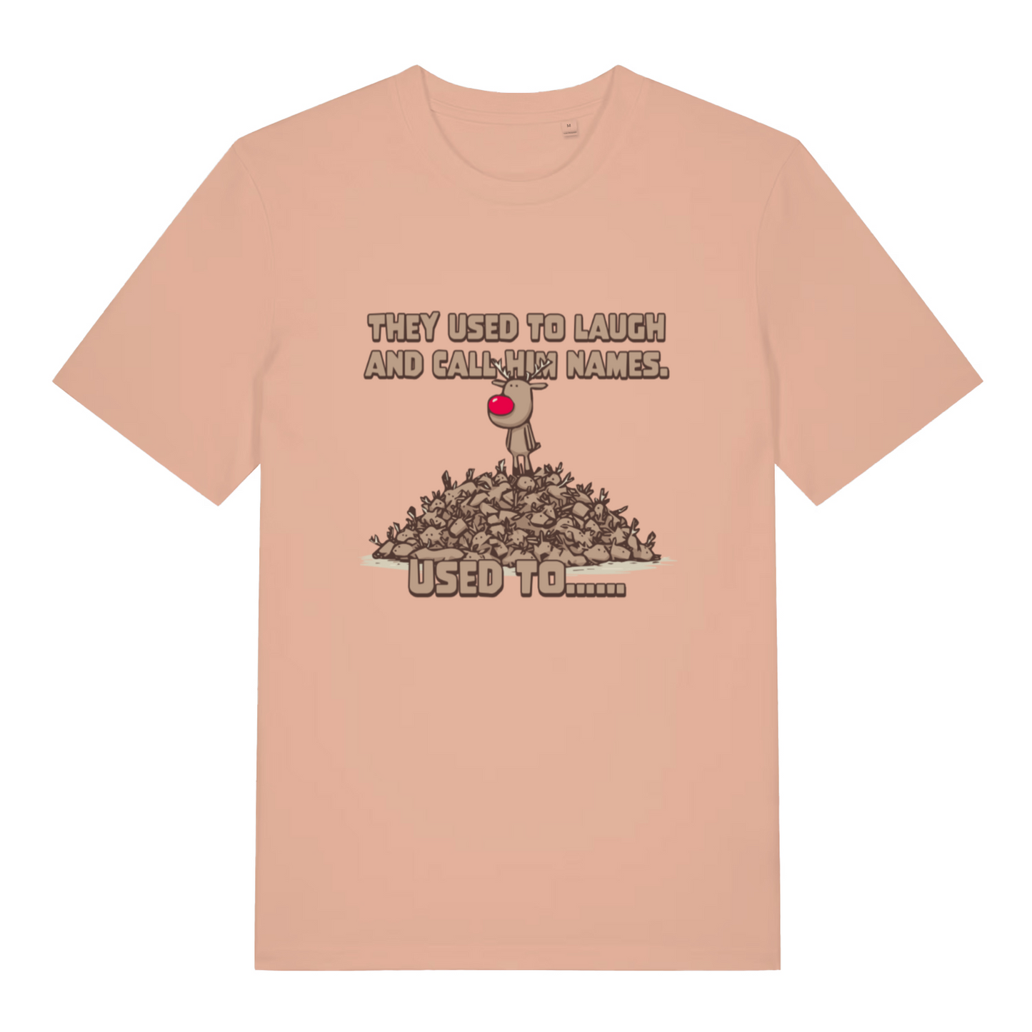 peach women's christmas t-shirt with the graphic of rudolph stood on top of a pile of reindeer with the slogan 'they used to laugh and call me names, used to'