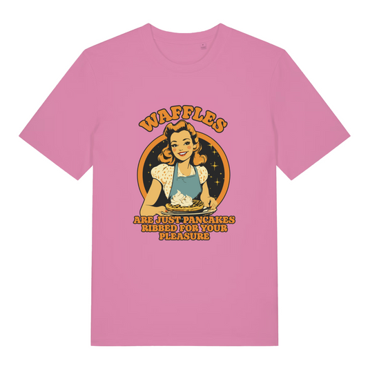 pink women's funny offensive t-shirt with a graphic of a woman making waffles and the slogan 'waffles are just pancakes ribbed for your pleasure'