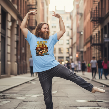 Man in a blue t-shirt dancing on a city street