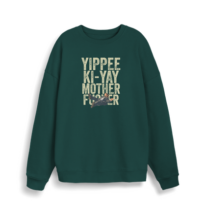green christmas jumper with the graphic of a man falling and the slogan 'yippee ki-yay mother fucker'