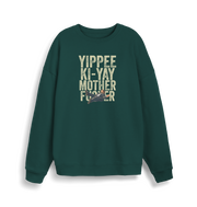 green christmas jumper with the graphic of a man falling and the slogan 'yippee ki-yay mother fucker'