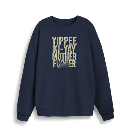 navy christmas jumper with the graphic of a man falling and the slogan 'yippee ki-yay mother fucker'