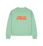 mint green womens oversized christmas sweater with the slogan 'yippee ki-yay motherfucker'