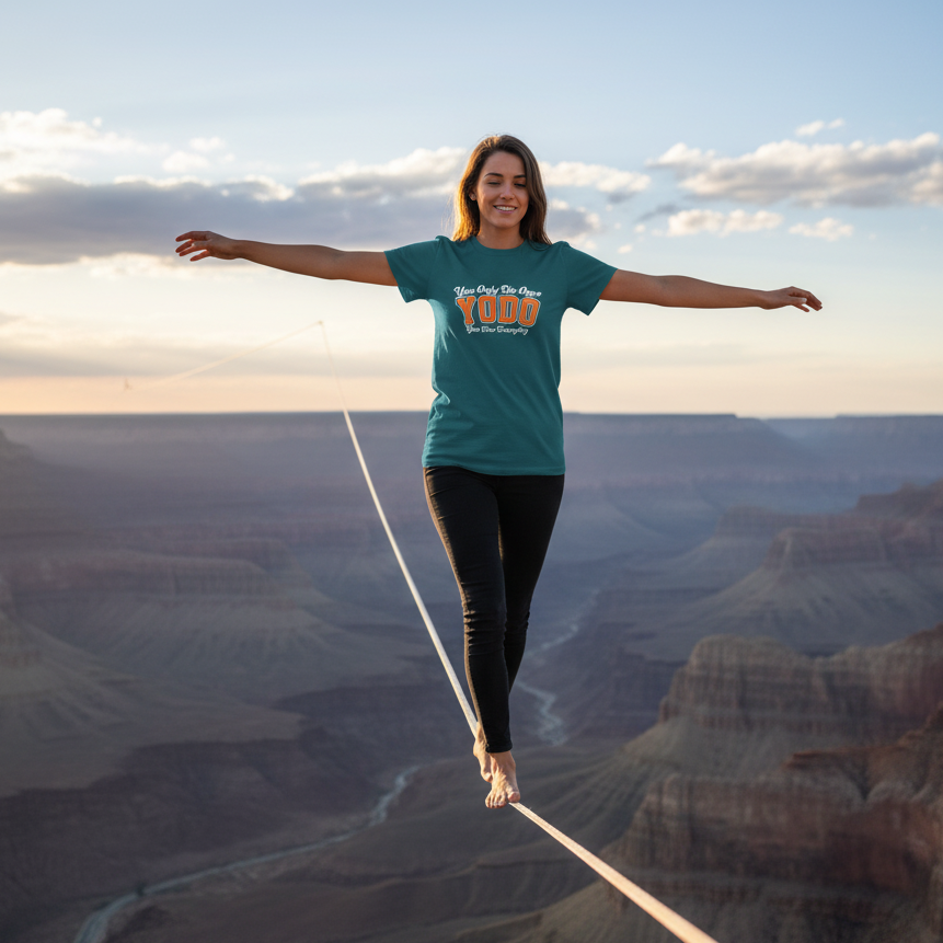 Person walking on a slackline over a canyon with a scenic background