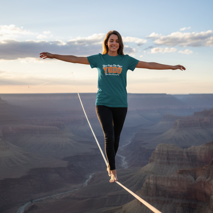 Person walking on a slackline over a canyon with a scenic background