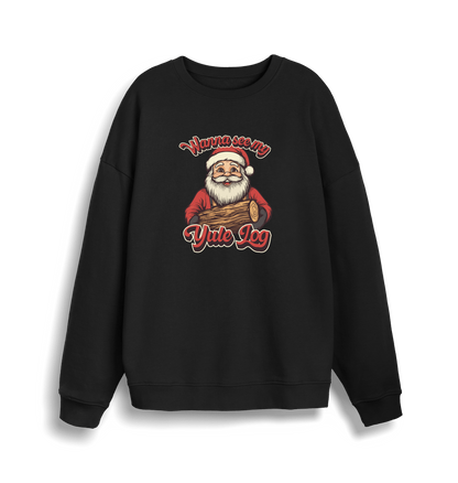 black christmas sweater with the graphic of santa holding a log and the slogan 'wanna see my yule log'
